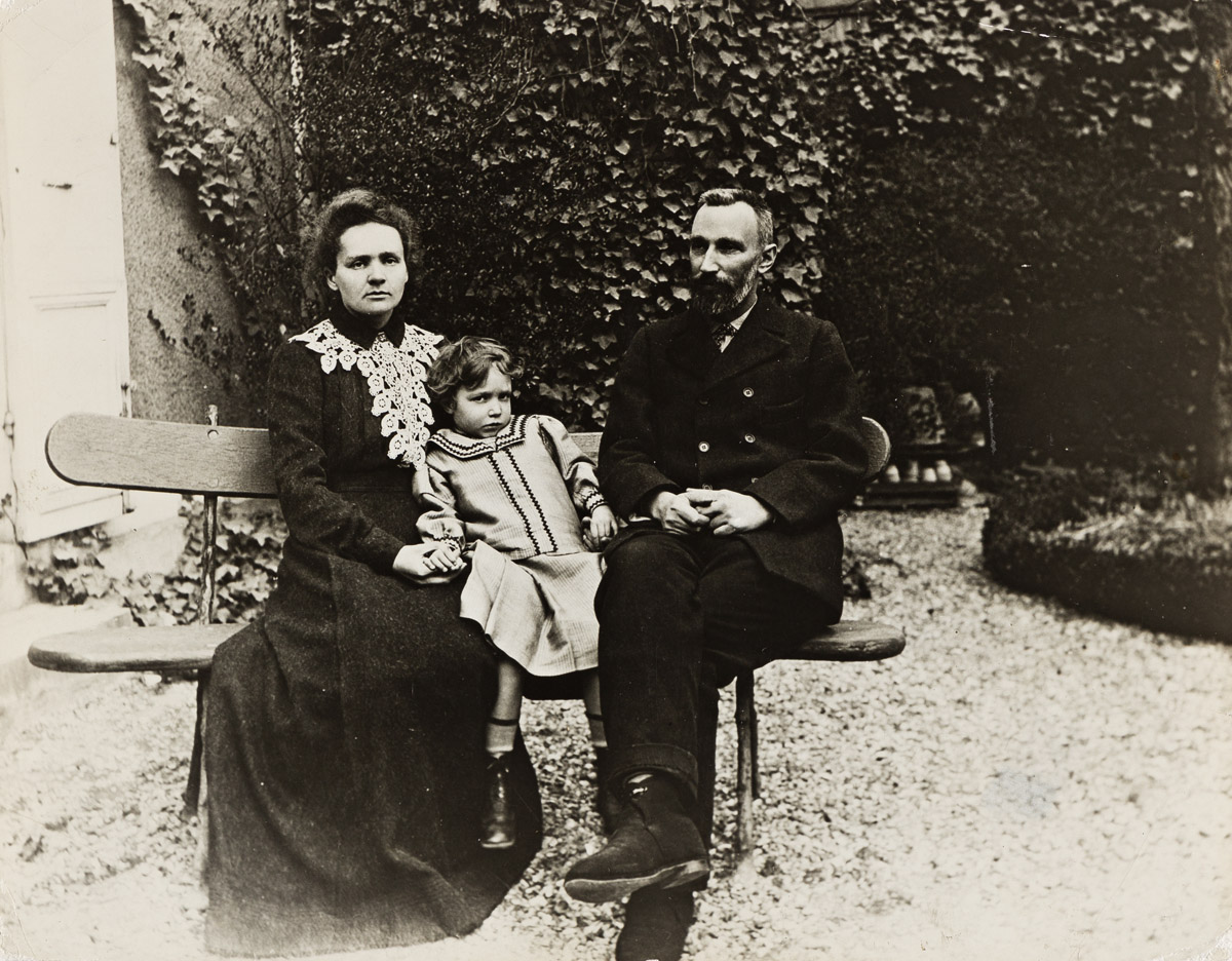 (MADAME CURIE--RADIUM) A group of 6 photographs depicting the Nobel Prize-winning chemist and physicist and her husband and daughter.